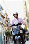 Businessman Riding Moped