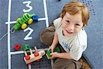 Boy with Wooden Toys