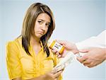 Woman paying for prescription