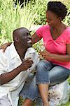 Couple Drinking Wine in Park