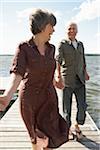 Couple Walking on Dock