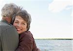 Couple Hugging by Water