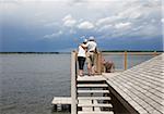 Couple Looking over Lake from Deck