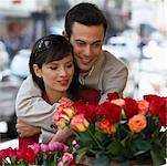 Couple Looking at Flowers in Store