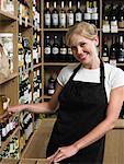 Woman Stocking Shelves in Store