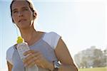 Woman Holding Water Bottle