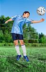 Garçon jouer au Soccer