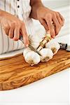 Woman Cutting Garlic