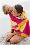 Mother and daughter in a towel