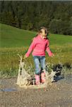 Girl Jumping in Puddles