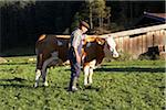 Farmer with Cow