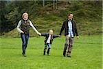 Family Walking in Field