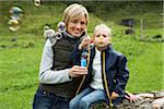 Mother and Daughter Blowing Bubbles