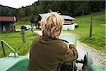 Boy Riding Tractor