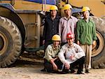 Portrait of five construction workers outdoors