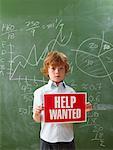 Boy Holding Help Wanted Sign