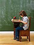 Boy in School Desk