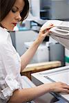 Businesswoman Using Photocopier