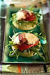 Goat cheese,duck breast,red peppers and rocket on polenta galette