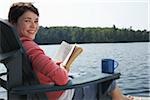 Woman Relaxing on Dock