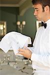 Waiter Polishing Glasses