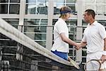 Tennis Players Shaking Hands at Net