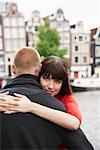 Couple by Canal, Amsterdam, Netherlands