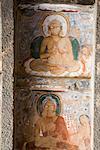 Fresco of Buddha on the wall of a cave, Ajanta, Maharashtra, India