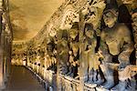 Buddha statues in a cave, Ajanta, Maharashtra, India