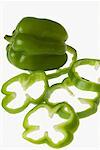 Close-up of a green bell pepper with slices