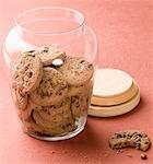 Close-up of brown biscuits in an open jar