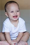 Close-up of a baby boy smiling