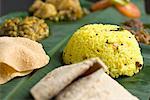 Indian cuisine served on a banana leaf