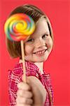 Girl holding a lolly