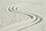 Curve pattern traced into sand