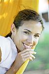 Woman resting in hammock, close-up