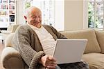 Senior Man Using Laptop Computer