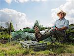 Portrait of Mature Man Sitting in Garden