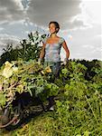 Woman Pushing Wheelbarrow