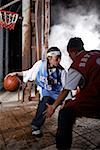 Young men playing basketball