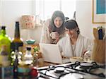 Couple in Kitchen Starting the Day