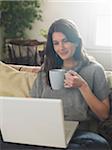 Portrait of Woman using Laptop Computer