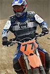 Motocross rider riding a motorcycle