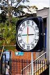 Stop watch in front of a building