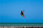 Rear view of a man kite boarding, Smathers Beach, Key West, Florida USA