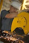 Close-up of a male construction worker working at a construction site