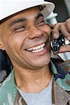 Close-up of a mature man talking on a mobile phone and smiling