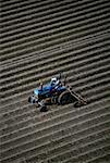 Aerial of field being plowed