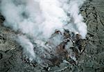 Plumes of stream rising from molten lava, Hawaii