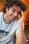 Close-up of a young man smiling